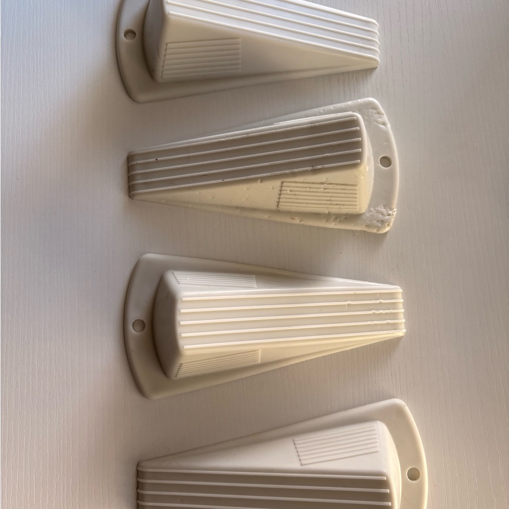 Set of Four White Door Stoppers
